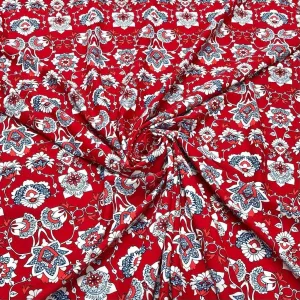 Blue and White Flower Shapes on Red Lycra Spandex Fabric